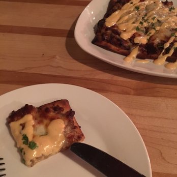 Laci's Tapas Bar - Lucious pig flatbread - Tapas/Small Plates Near Me - Syracuse, New York Laci's Tapas Bar - Lucious pig flatbread - Tapas/Small Plates Near Me - Syracuse, New York