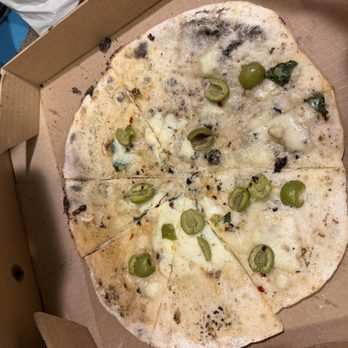 Fireflour Pizza + Coffee Bar - Pizza with almost no toppings.....photo after we sliced ourselves - Pizza Near Me - Bismarck, North Dakota Fireflour Pizza + Coffee Bar - Pizza with almost no toppings.....photo after we sliced ourselves - Pizza Near Me - Bismarck, North Dakota