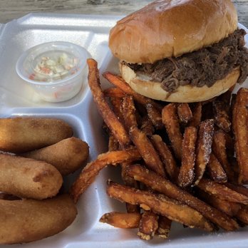 Pigman's Barbeque - Beef BBQ boat with sweet potato fries - Sandwiches Near Me - Kill Devil Hills, North Carolina Pigman's Barbeque - Beef BBQ boat with sweet potato fries - Sandwiches Near Me - Kill Devil Hills, North Carolina