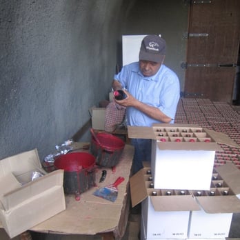 Dunn Vineyards - Making the wax capsule on the Howell Mountain Cabernet. - Wineries Near Me - Angwin, California