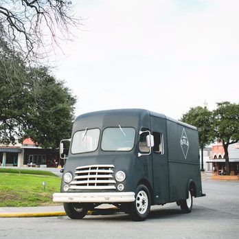 Gold Epicure - a black truck parked on the side of the road - Food Trucks Near Me Gold Epicure - a black truck parked on the side of the road - Food Trucks Near Me