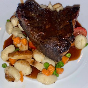 Mitchell's Steakhouse - Short rib with potato gnocchi and veggies - Steakhouses Near Me - Columbus, Ohio Mitchell's Steakhouse - Short rib with potato gnocchi and veggies - Steakhouses Near Me - Columbus, Ohio