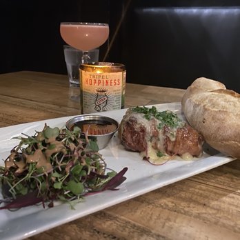 Brussels Bistro - Bacon Wrapped Brie and the Enchantress in the background - Belgian Near Me - Laguna Beach, California