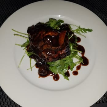 Tendrils Restaurant - Baseball cut steak. Very good. On bed of arugula. With mushroom strawberry demi glaze. Cooked perfect. Part 4 of 5 course meal. - New American Near Me - Quincy, Washington Tendrils Restaurant - Baseball cut steak. Very good. On bed of arugula. With mushroom strawberry demi glaze. Cooked perfect. Part 4 of 5 course meal. - New American Near Me - Quincy, Washington