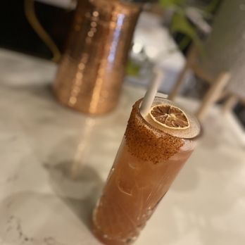 The Broken Cage - a drink in a tall glass - Cocktail Bars Near Me - Denver, Colorado