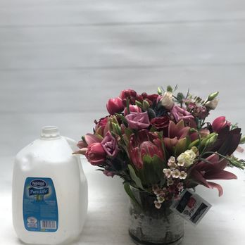 Valentine Florist - Next to milk gallon for size purpose - Florists Near Me - Houston, Texas