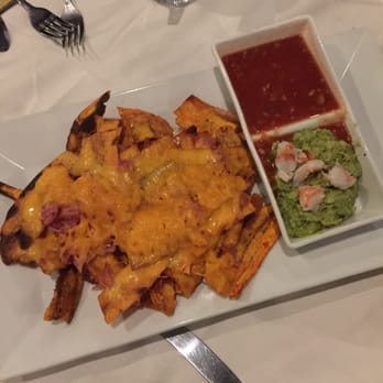 Casa Del Campo - Dominican Nachos, fried plantains w/ bacon Cheese guac con camarones and salsa - Dominican Near Me - North Babylon, New York Casa Del Campo - Dominican Nachos, fried plantains w/ bacon Cheese guac con camarones and salsa - Dominican Near Me - North Babylon, New York