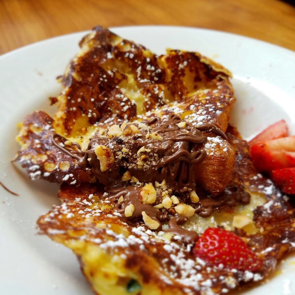 Nutella Cafe - Croissant French toast with Nutella and strawberries - Desserts Near Me - Chicago, Illinois Nutella Cafe - Croissant French toast with Nutella and strawberries - Desserts Near Me - Chicago, Illinois