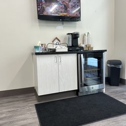 Champagne Pediatric Dentistry - Tv and water/coffee station