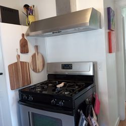 Precision Cut Construction - Range hood freshly lowered