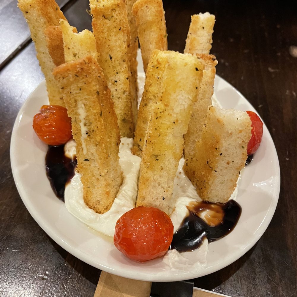 Highland Grill - Lemon Goat Cheese  with croutes, blistered cherry tomatoes and balsamic (V) $4 (Happy Hour menu) - Cocktail Bars Near Me - Saint Paul, Minnesota