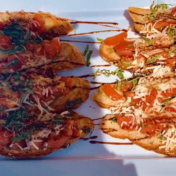 Lucille Caters - Our delicious Torched Bruschetta with a fig glaze - Caterers Near Me Lucille Caters - Our delicious Torched Bruschetta with a fig glaze - Caterers Near Me