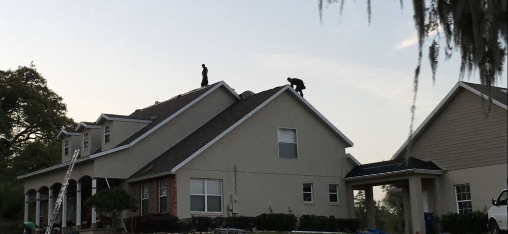 Slide of Belcher Roofing