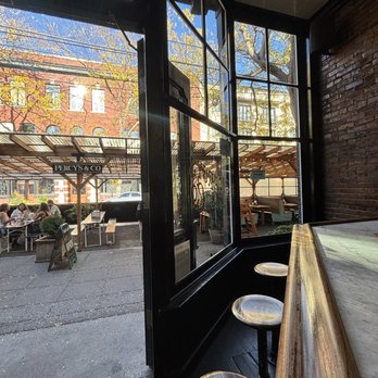 Percy's & Co. - Bar with a view out the front door - Gastropubs Near Me - Seattle, Washington Percy's & Co. - Bar with a view out the front door - Gastropubs Near Me - Seattle, Washington