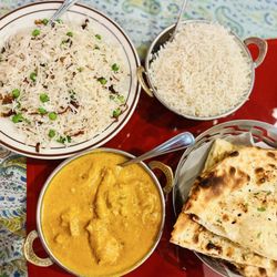 Avatar Indian Bistro - Cumin pea pulao rice, white rice, pistachio chicken korma, garlic cilantro naan