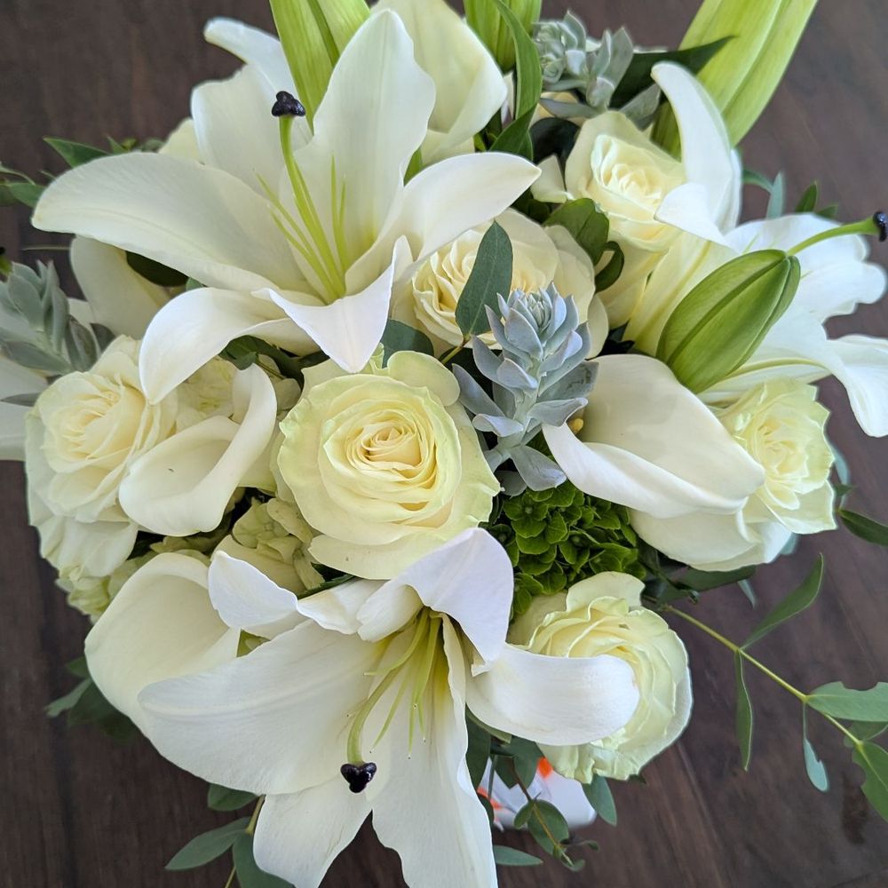 Bloomingdale Florist - Perfect mix of white heavenly-smelling lilies, roses, and a touch of sage green with succulents! - Florists Near Me - Brandon, Florida Bloomingdale Florist - Perfect mix of white heavenly-smelling lilies, roses, and a touch of sage green with succulents! - Florists Near Me - Brandon, Florida