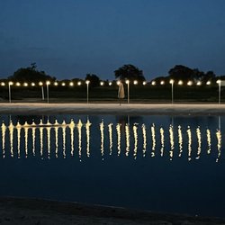 Rustic Waters RV Resort - Lighted Swimming Pond