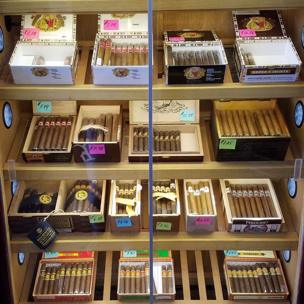 Rocky Mountain Cigar - One out of three cigar selection vitrines - Tobacco Shops Near Me - Fairplay, Colorado