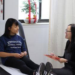 Energize Physical Therapy - Dr. Mak doing an initial evaluation