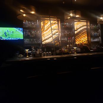 The Ridge Room - Cool back-lit walls behind the bar - Lounges Near Me - Harrisonburg, Virginia The Ridge Room - Cool back-lit walls behind the bar - Lounges Near Me - Harrisonburg, Virginia