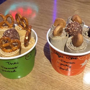 Iceland Ice Cream - Thai tea with pretzels and ferrero rocher and nestle coffee with panda cookies, ferrero rocher and pocky, both were delicious! - Ice Cream & Frozen Yogurt Near Me - Arlington, Texas