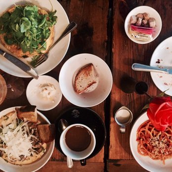 Dell'anima - Our colorful table at brunch. Frittata, bucatini and the amazing uova funghi. - Italian Near Me - New York, New York
