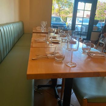 The Wild Artichoke - Booth back and tables. - New American Near Me - Yorba Linda, California The Wild Artichoke - Booth back and tables. - New American Near Me - Yorba Linda, California