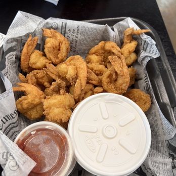 St Joe Shrimp - Shrimp with cocktail sauce, grits and 2 hush puppies. - Seafood Markets Near Me - Port Saint Joe, Florida St Joe Shrimp - Shrimp with cocktail sauce, grits and 2 hush puppies. - Seafood Markets Near Me - Port Saint Joe, Florida