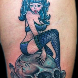 Pin-up tattoo by Marcus Hardy