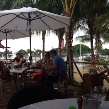 U-Tiki Beach - View of the lighthouse and intercostal from the table. - Seafood Near Me - Jupiter, Florida U-Tiki Beach - View of the lighthouse and intercostal from the table. - Seafood Near Me - Jupiter, Florida