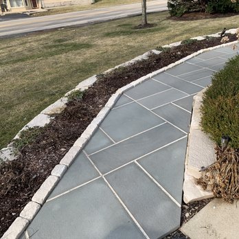847 Landscaping - a sidewalk with a stone edging - Tree Services Near Me 847 Landscaping - a sidewalk with a stone edging - Tree Services Near Me