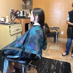 Emily Thai - My daughter wanted to cut her long hair into a pixie cut.