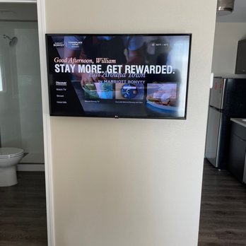 Town Place Suites by Marriott - The "Jumbotron" on the wall between loo and kitchen. - Hotels Near Me - Leesburg, Florida Town Place Suites by Marriott - The "Jumbotron" on the wall between loo and kitchen. - Hotels Near Me - Leesburg, Florida