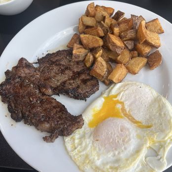 Toast It IZ - 8oz Steak Ribeye with seasoned potatoes and over easy egg - Breakfast & Brunch Near Me - Evergreen Park, Illinois Toast It IZ - 8oz Steak Ribeye with seasoned potatoes and over easy egg - Breakfast & Brunch Near Me - Evergreen Park, Illinois