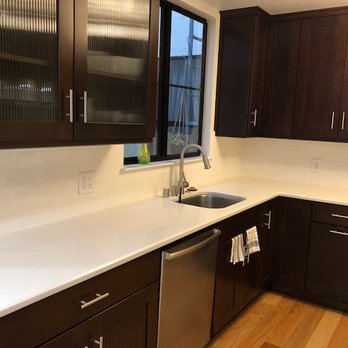 Alex's Custom Tile - After - clean white, 12x3 textured subways - General Contractors Near Me
