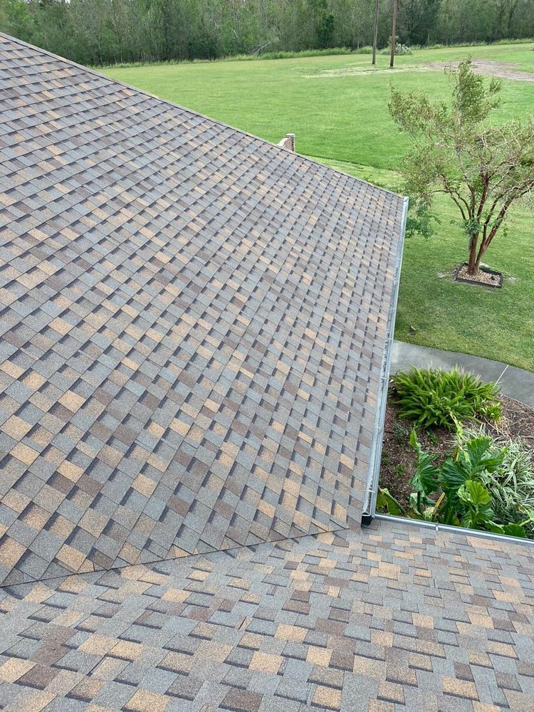 Slide of Pelican Roofing Company