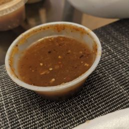 a bowl of soup on a table a bowl of soup on a table