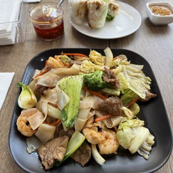 Fu Belly - Drunken noodles with combination protein and grilled chicken Spring Rolls - Vietnamese Near Me - Chandler, Arizona Fu Belly - Drunken noodles with combination protein and grilled chicken Spring Rolls - Vietnamese Near Me - Chandler, Arizona