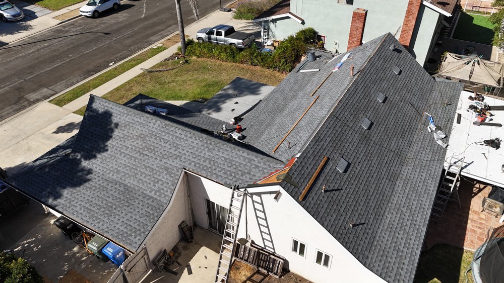 Slide of Twins Roofing