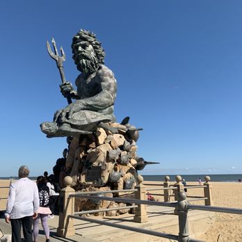 Neptune's Park - a statue of a man sitting on a rock - Parks Near Me - Virginia Beach, Virginia Neptune's Park - a statue of a man sitting on a rock - Parks Near Me - Virginia Beach, Virginia
