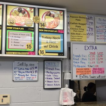 Cody Seafood - menus and prices on the wall - Seafood Near Me - Mobile, Alabama