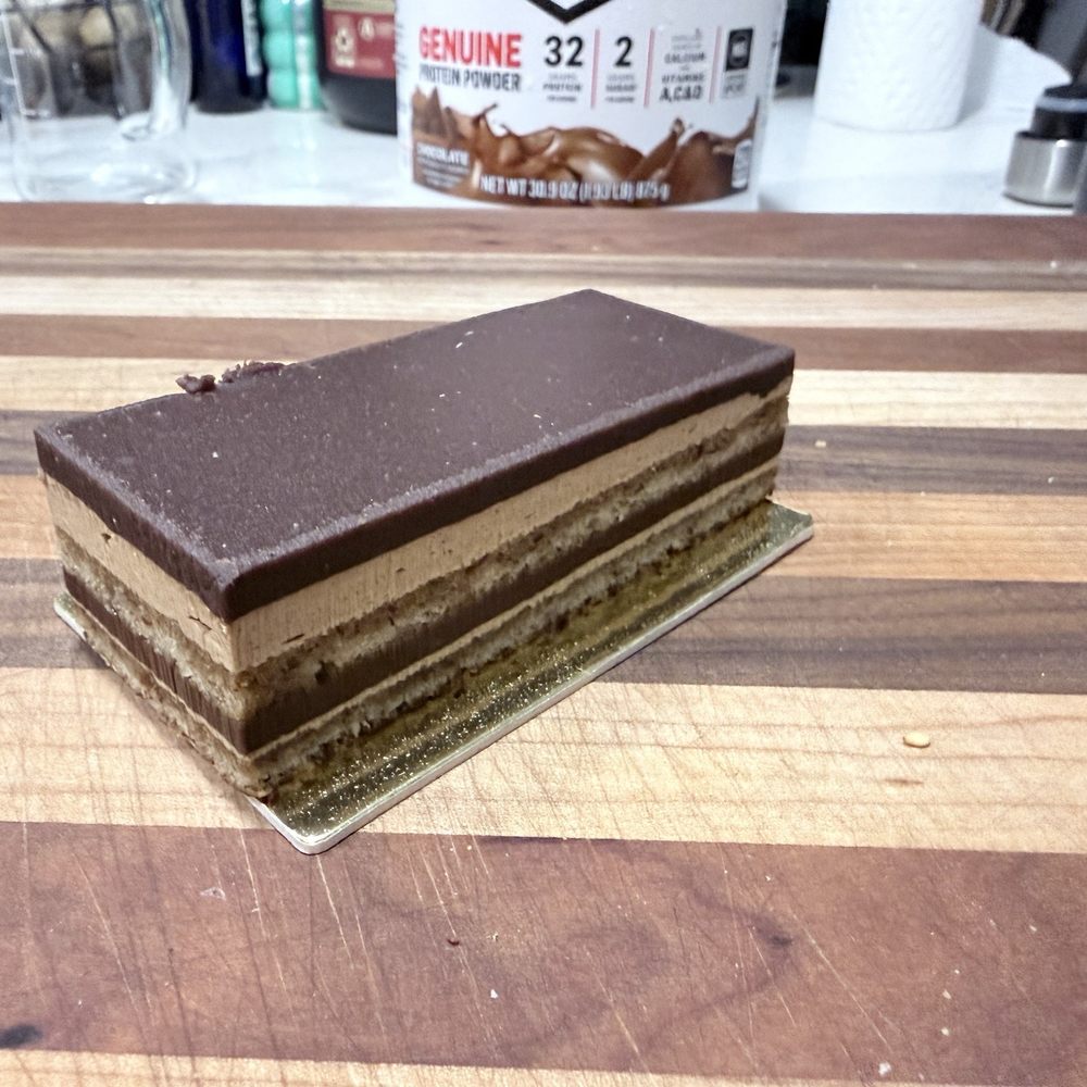 Opera Cake - Magnificent texture and chocolate is incredible. I'm eating one every Sunday. Opera Cake - Magnificent texture and chocolate is incredible. I'm eating one every Sunday.