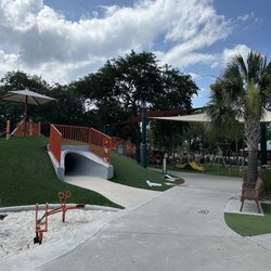 The green area to the left is a nice fake grass area that the kids can climb and venture around.