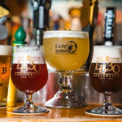 Lucky Baldwins Pub - Our custom beer glasses filled with Belgium and British tapped beer