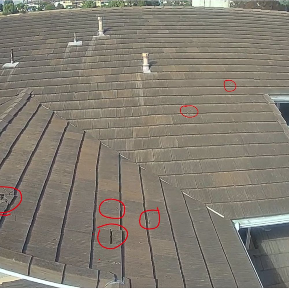 Top Quality Roofing - I circled the tiles that appear to have cracks, and shared the photos to the roofing company to get an estimate. - Roofing Near Me - San Clemente, California Top Quality Roofing - I circled the tiles that appear to have cracks, and shared the photos to the roofing company to get an estimate. - Roofing Near Me - San Clemente, California