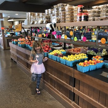 Reiff's Farm Market - a little girl standing in front of a fruit stand - Farmers Market Near Me - Ephrata, Pennsylvania Reiff's Farm Market - a little girl standing in front of a fruit stand - Farmers Market Near Me - Ephrata, Pennsylvania