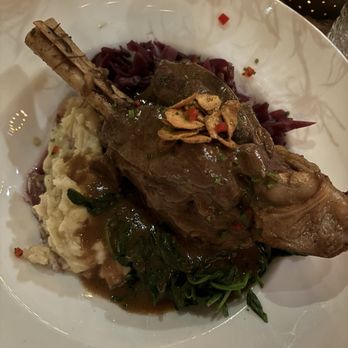 Terrapin Restaurant - Guinness Braised Lamb Shank topped with Garlic Chips (Only available after 5pm) - New American Near Me - Rhinebeck, New York Terrapin Restaurant - Guinness Braised Lamb Shank topped with Garlic Chips (Only available after 5pm) - New American Near Me - Rhinebeck, New York