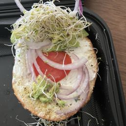Barely any avocado in a tiny slice of tomato. Prepared by the Mexican girl working there. Barely any avocado in a tiny slice of tomato. Prepared by the Mexican girl working there.