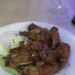 Beach House Bar & Grill - 50c Satay wings with celery and ranch dressing