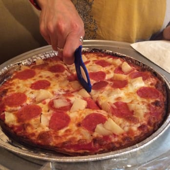 Jersey's Tomato Pie & Bistro - Gluten free pizza with pizza cutter - Italian Near Me - Southampton, Pennsylvania Jersey's Tomato Pie & Bistro - Gluten free pizza with pizza cutter - Italian Near Me - Southampton, Pennsylvania